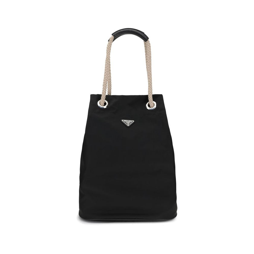 Black Recycled Polyamide Shoulder BagMedium Mariner Re-Nylon Bucket Bag by Prada combines functional design and sustainable materials. The soft, roomy silhouette is enhanced by rope and leather sliding handles that contrast with the technical texture of R