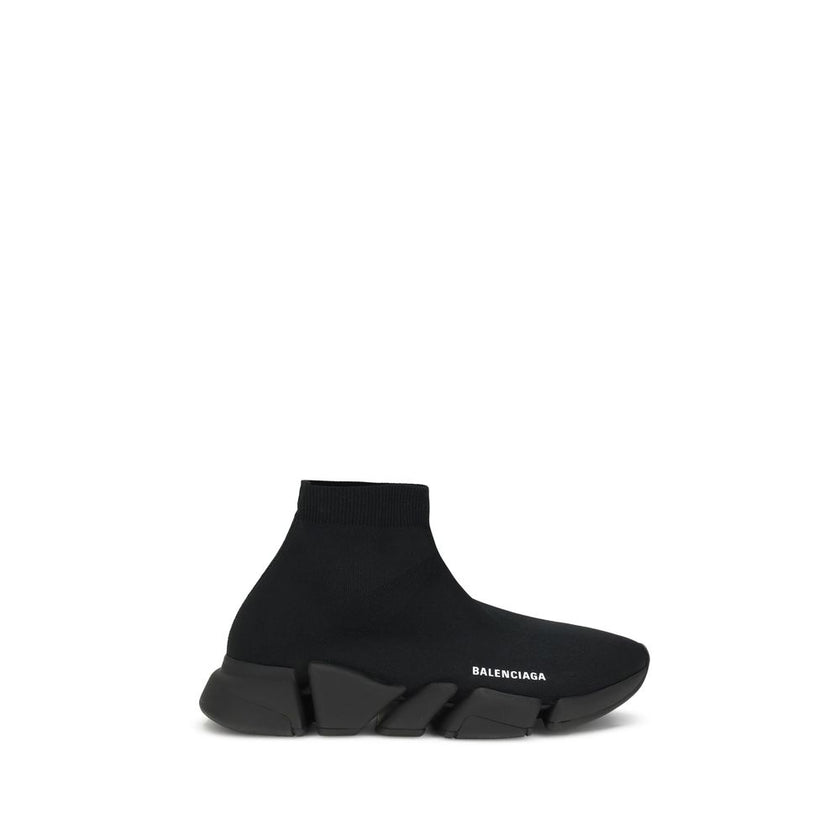 Black Rubber Athletic SneakersSpeed 2.0 Sneakers by Balenciaga feature a sock-like design with a sleek profile, elongated toe and ribbed ankle detail for a snug fit. The contrasting logo on the side and textured sole complete an urban, contemporary style