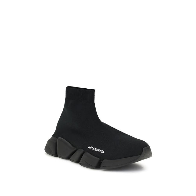 Black Rubber Athletic SneakersSpeed 2.0 Sneakers by Balenciaga feature a sock-like design with a sleek profile, elongated toe and ribbed ankle detail for a snug fit. The contrasting logo on the side and textured sole complete an urban, contemporary style