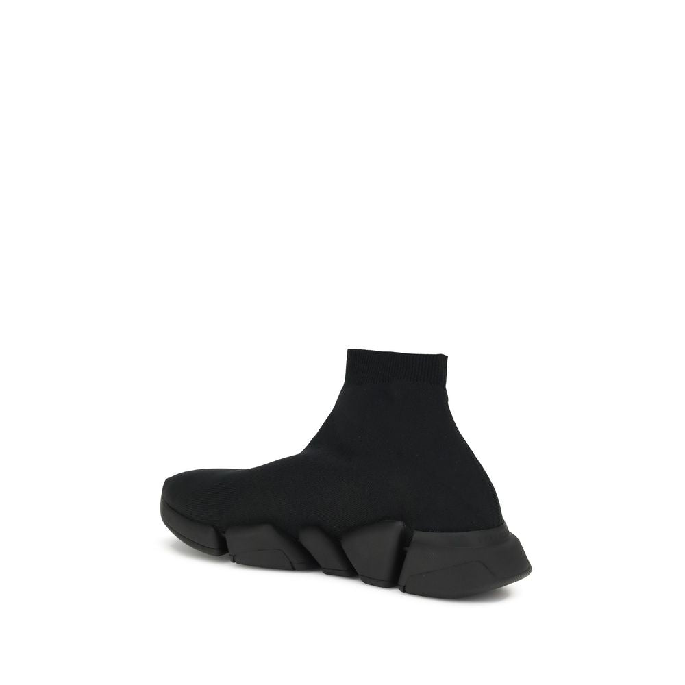 Black Rubber Athletic SneakersSpeed 2.0 Sneakers by Balenciaga feature a sock-like design with a sleek profile, elongated toe and ribbed ankle detail for a snug fit. The contrasting logo on the side and textured sole complete an urban, contemporary style