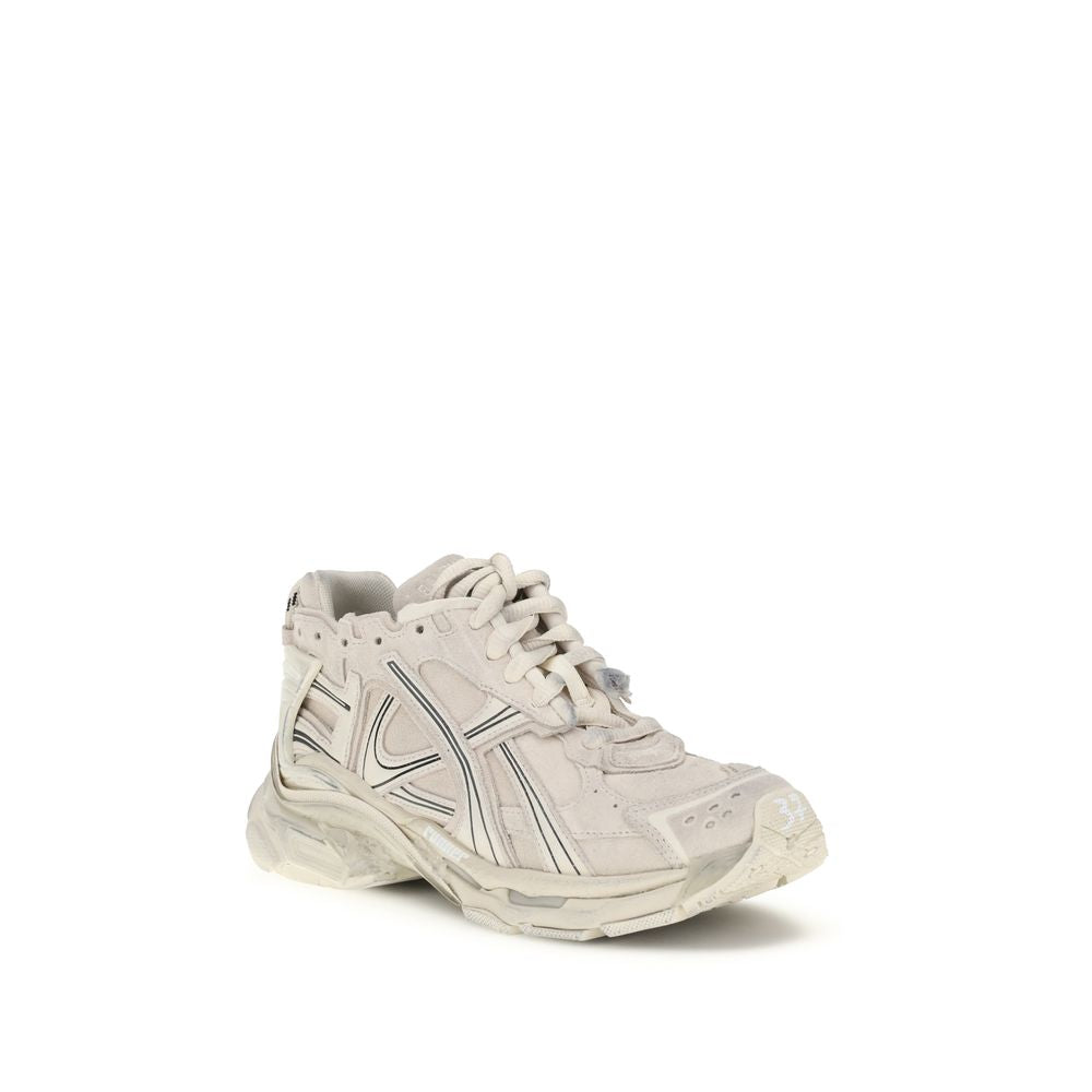 Beige Rubber Athletic SneakersThe Runner Sneakers by Balenciaga blend sportswear aesthetics with artisanal craftsmanship. Inspired by trekking and running shoes, they feature a layered, high-performance construction finished with a vintage wash that creat