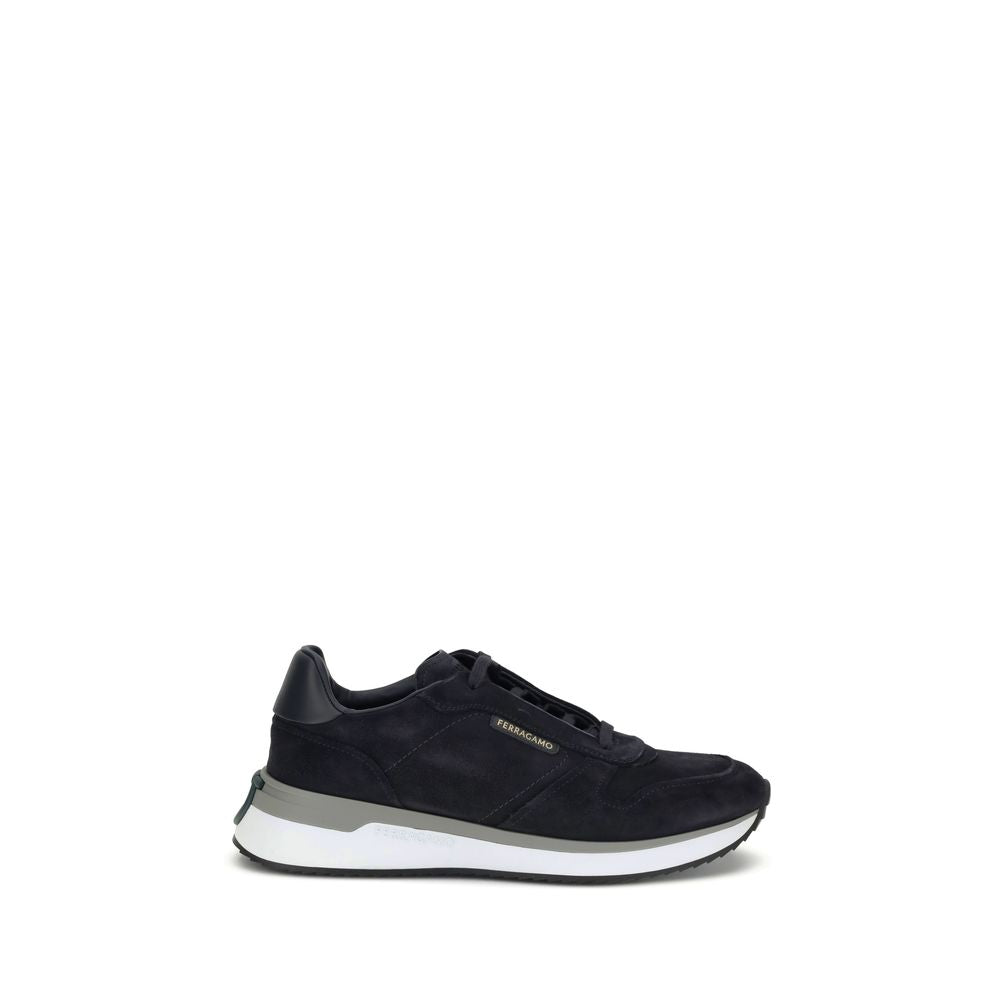 Blue Rubber Athletic SneakersSuede Sneakers by Ferragamo stand out for their essential design and urban inspiration. The clean lines, emphasized by the special hidden lacing, recall running models, reinterpreted with metropolitan materials and details. Th