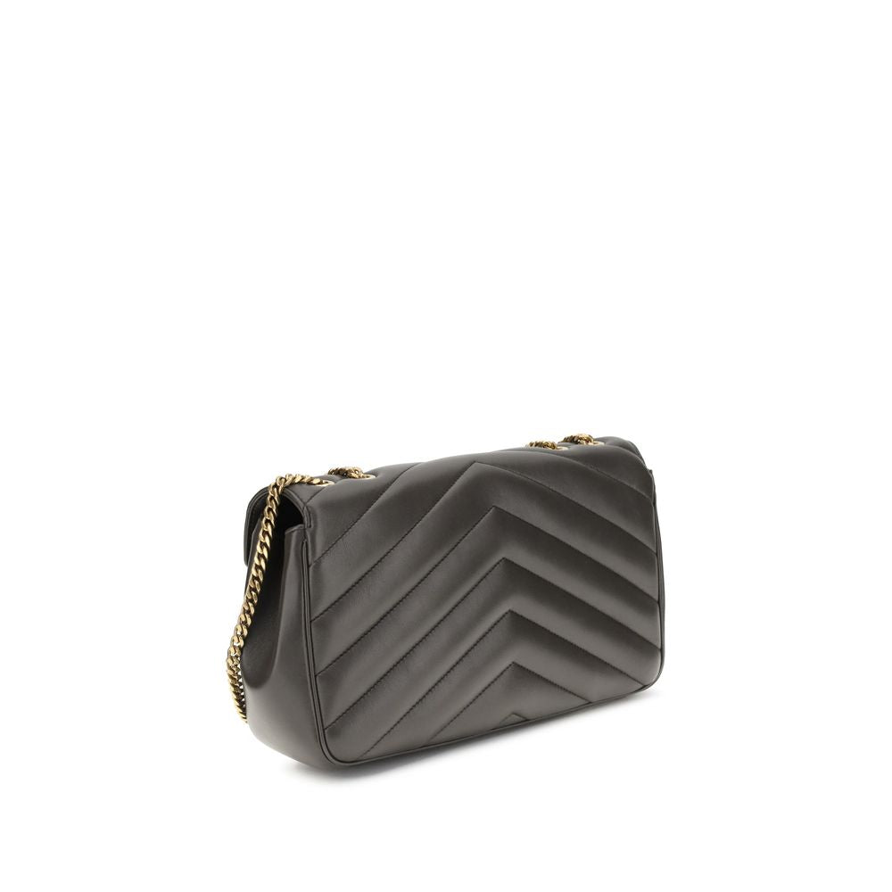 Gray Calf Leather Bos Taurus Shoulder BagThe LouLou Shoulder Bag by Saint Laurent is an icon of timeless elegance. Crafted with the unmistakable quilted design, it features a front closure with magnetic flap embellished with the brass logo applied on the