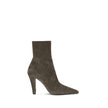 Jill suede Ankle BootsJill suede Ankle Boots by Saitn Laurent combine elegance and modernity with their square toe and wide tapered heel. The distinctive detail is the bronze metal Cassandre motif on the inside, while the side zipper closure ensures pract