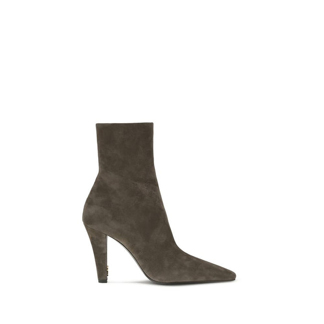 Jill suede Ankle BootsJill suede Ankle Boots by Saitn Laurent combine elegance and modernity with their square toe and wide tapered heel. The distinctive detail is the bronze metal Cassandre motif on the inside, while the side zipper closure ensures pract