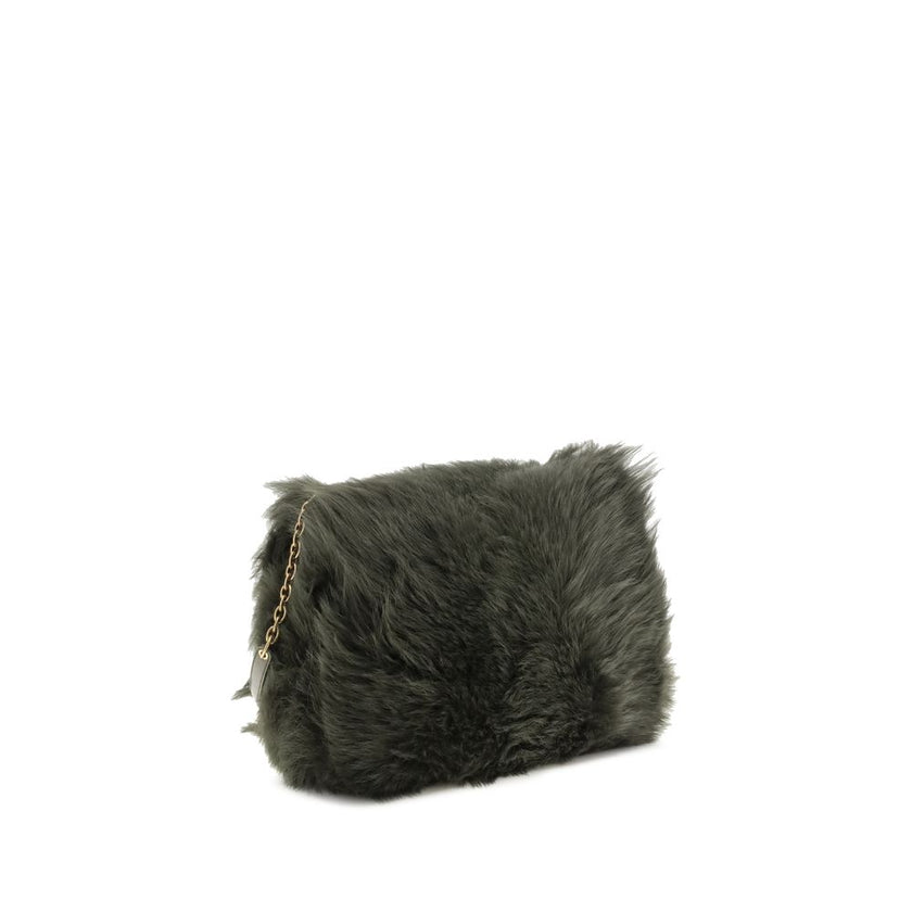 Green Lamb Ovis Aries Aries Shoulder BagThe Jamie medium Shearling Shoulder Bag by Saint Laurent is a refined and eye-catching accessory embellished with the CASSANDRE decoration on the front. Lightweight and roomy, it features an adjustable sliding shoul