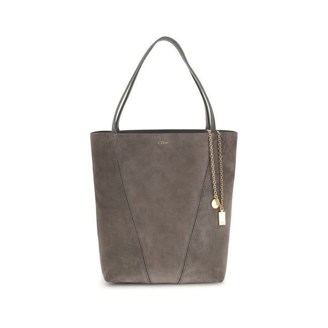 Gray Calf Leather Bos Taurus Shoulder BagThe Chloé Spin Tote Bag in suede combines a minimalist silhouette with iconic details. The two leather handles ensure practicality, while the pendant chain with the Chloé and Horse medals adds a distinctive touch.