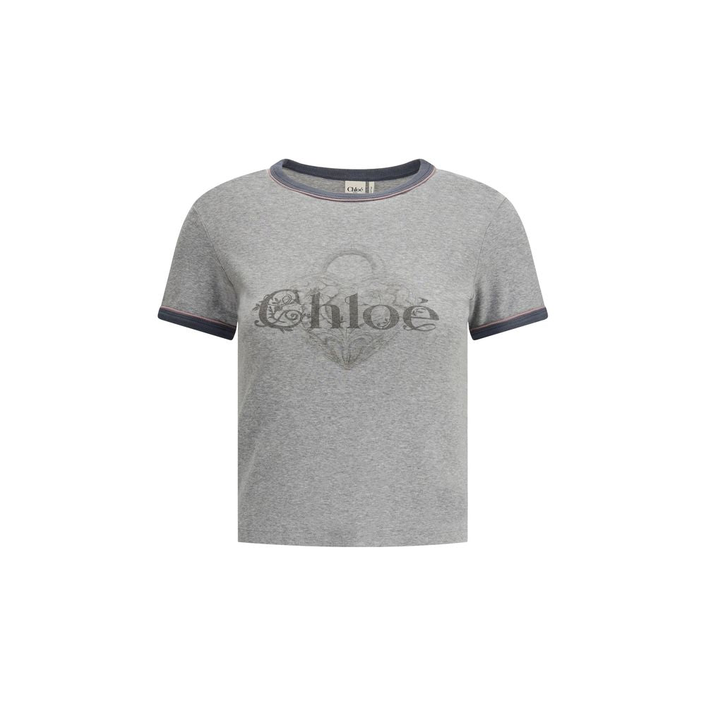 Gray Cotton ClothingThe Baby Fit Logo T-shirt by Chloé embodies the elegance of simplicity and the purity of clean lines. Crafted from soft organic cotton jersey, it offers a comfortable fit with an understated silhouette. A subtle embroidered detail at t