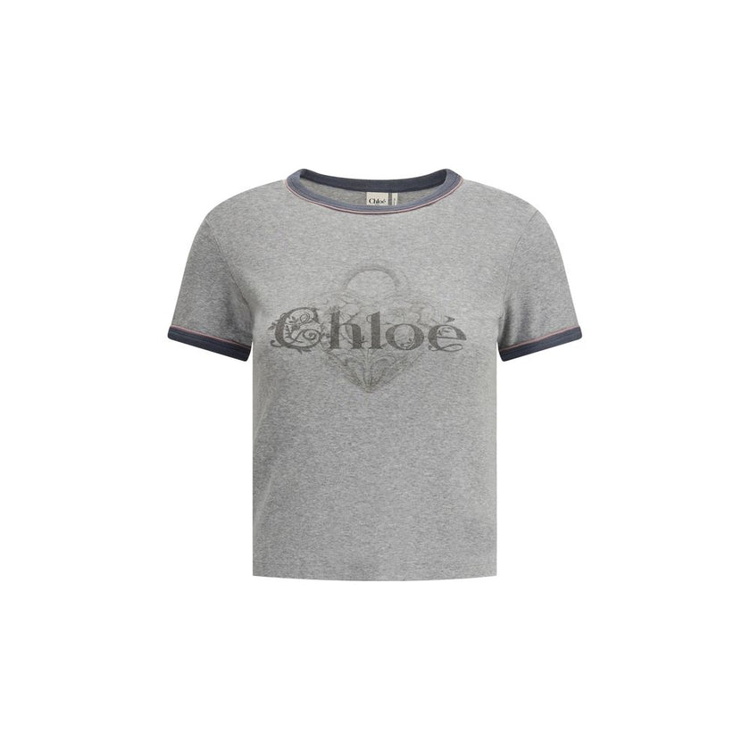 Gray Cotton ClothingThe Baby Fit Logo T-shirt by Chloé embodies the elegance of simplicity and the purity of clean lines. Crafted from soft organic cotton jersey, it offers a comfortable fit with an understated silhouette. A subtle embroidered detail at t