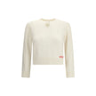 Cream Wool SweatshirtThe Jumper by Chloé blends lightness and refinement with an openwork motif that highlights its ethereal elegance. A buttoned keyhole neck brings a touch of femininity and sophistication, while ribbed trims softly define the silhouette