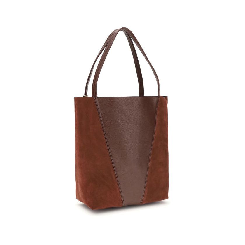 Brown Leather Shoulder BagThe Spin Shoulder Bag by Chloè captures the effortless elegance of the French Maison. Crafted from a refined combination of grained leather and suede, it features a subtle laminated logo on the front. Two flat leather handles enh