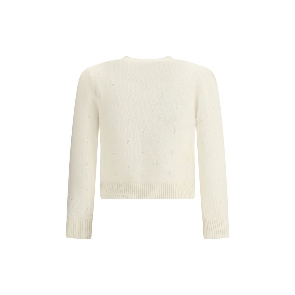 Cream Wool SweatshirtThe Jumper by Chloé blends lightness and refinement with an openwork motif that highlights its ethereal elegance. A buttoned keyhole neck brings a touch of femininity and sophistication, while ribbed trims softly define the silhouette