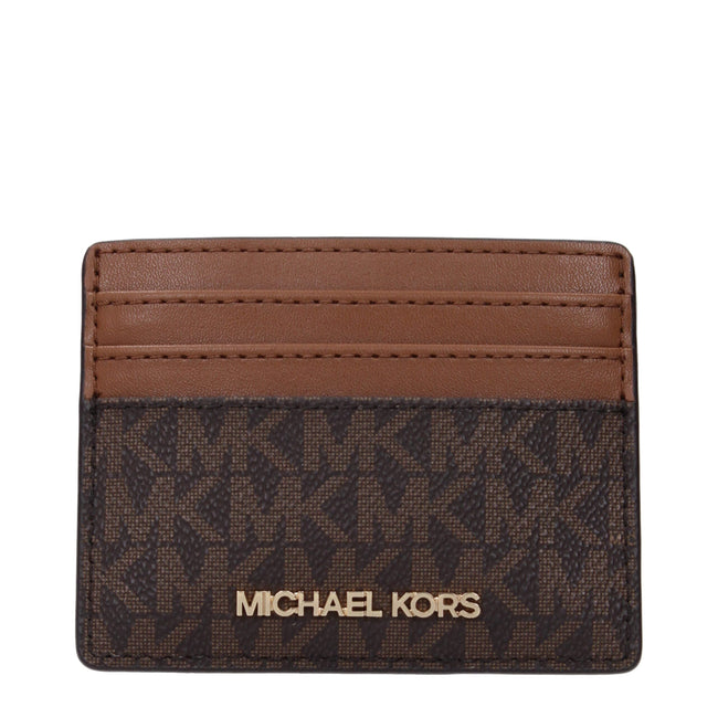 Brown Fabric CardholderDescription: The product with MPN 35F8GTVD3BBROWN and code F85045 fabric in brown is a document holders designed by Michael Kors. It has features like front logo.Brown Fabric Cardholder${tagsMichael KorsAulae Brown Fabric Cardholder