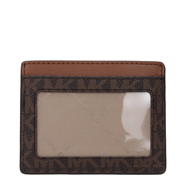 Brown Fabric CardholderDescription: The product with MPN 35F8GTVD3BBROWN and code F85045 fabric in brown is a document holders designed by Michael Kors. It has features like front logo.Brown Fabric Cardholder${tagsMichael KorsAulae Brown Fabric Cardholder