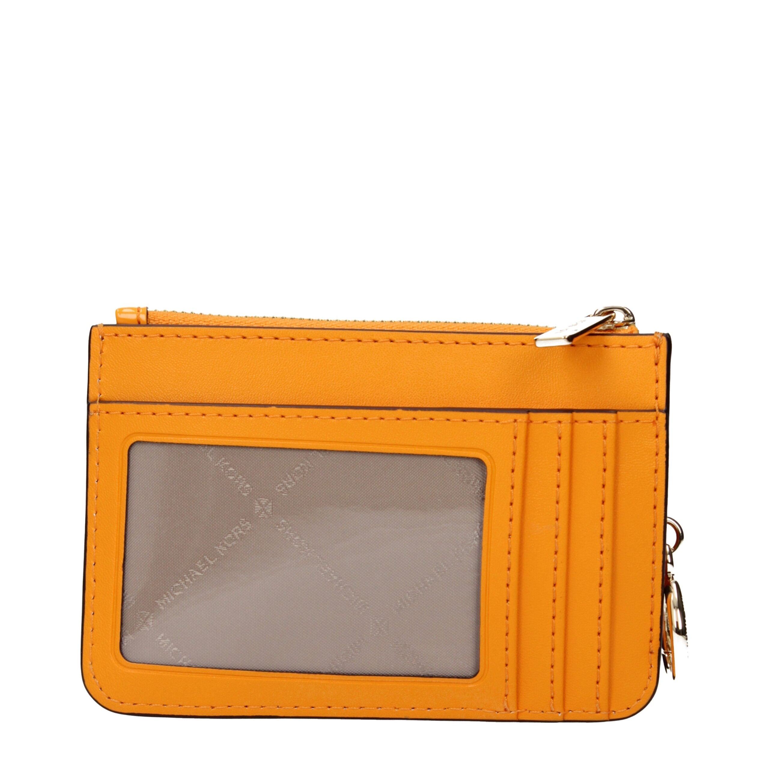 Orange Leather WalletDescription: The product with MPN 35T5GTVP1APOPORANGE and code F85052 patent leather in orange is a coin purses designed by Michael Kors. It has features like front logo.Orange Leather Wallet${tagsMichael KorsAulae Orange Leather Wall