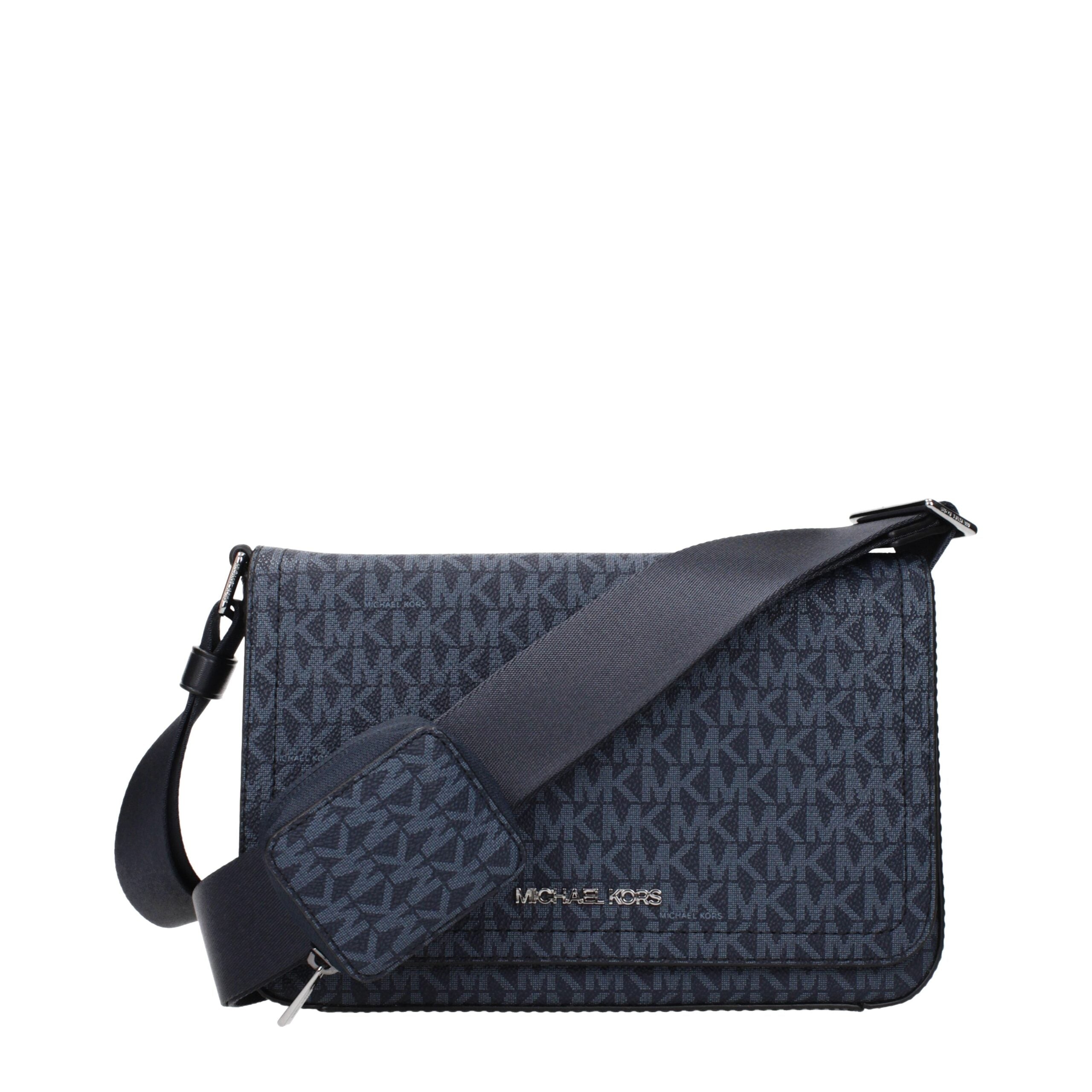 Blue Fabric Crossbody BagDescription: The product with MPN 37R5LCOM6BADMRLPLBLUE and code F85059 fabric in blue is a crossbody bags designed by Michael Kors. It has features like logo, adjustable shoulder.Blue Fabric Crossbody Bag${tagsMichael KorsAulae B