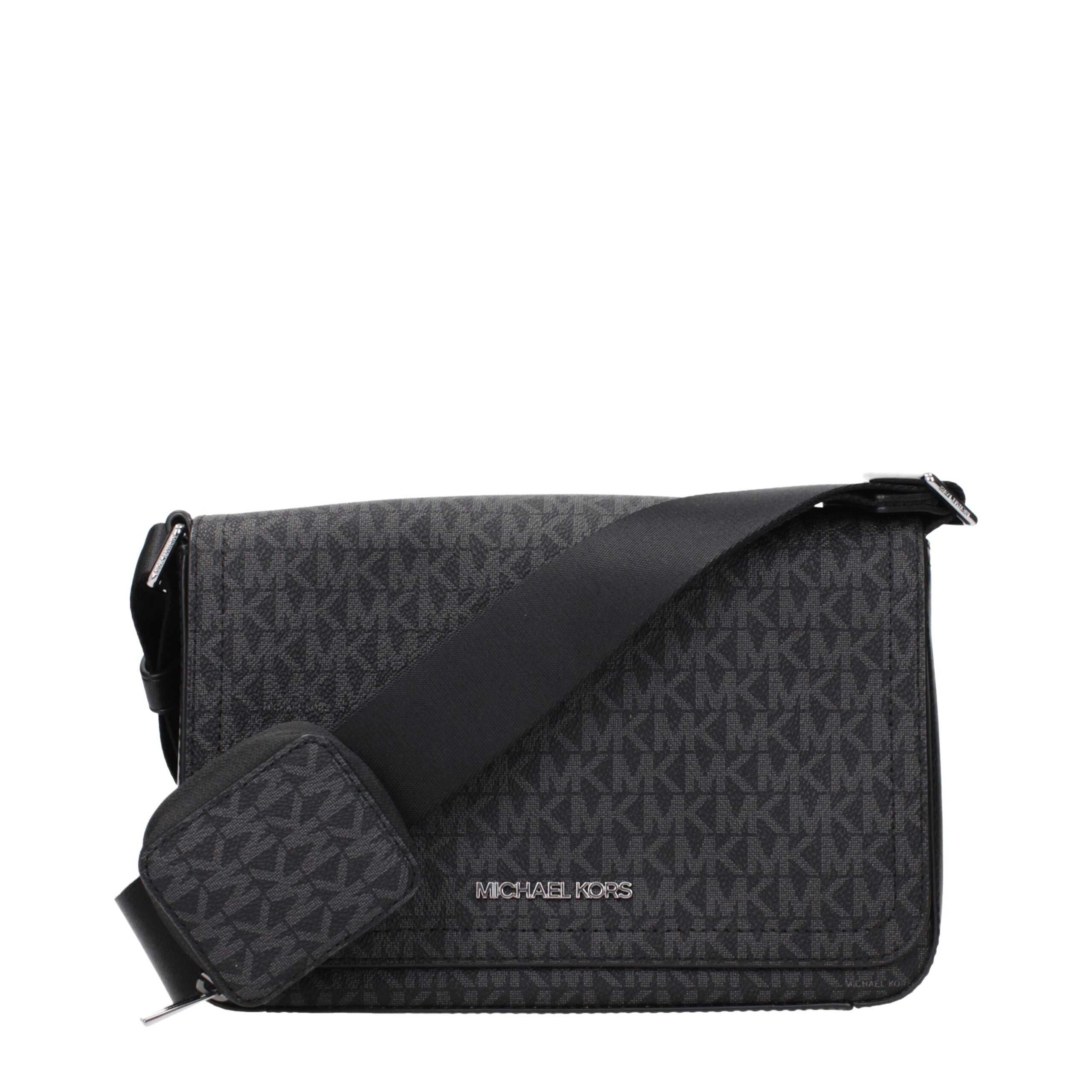 Black Fabric Crossbody BagDescription: The product with MPN 37R5LCOM6BBLACK and code F85059 fabric in black is a crossbody bags designed by Michael Kors. It has features like logo, adjustable shoulder.Black Fabric Crossbody Bag${tagsMichael KorsAulae Blac