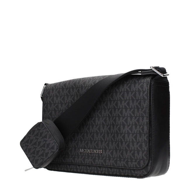 Black Fabric Crossbody BagDescription: The product with MPN 37R5LCOM6BBLACK and code F85059 fabric in black is a crossbody bags designed by Michael Kors. It has features like logo, adjustable shoulder.Black Fabric Crossbody Bag${tagsMichael KorsAulae Blac