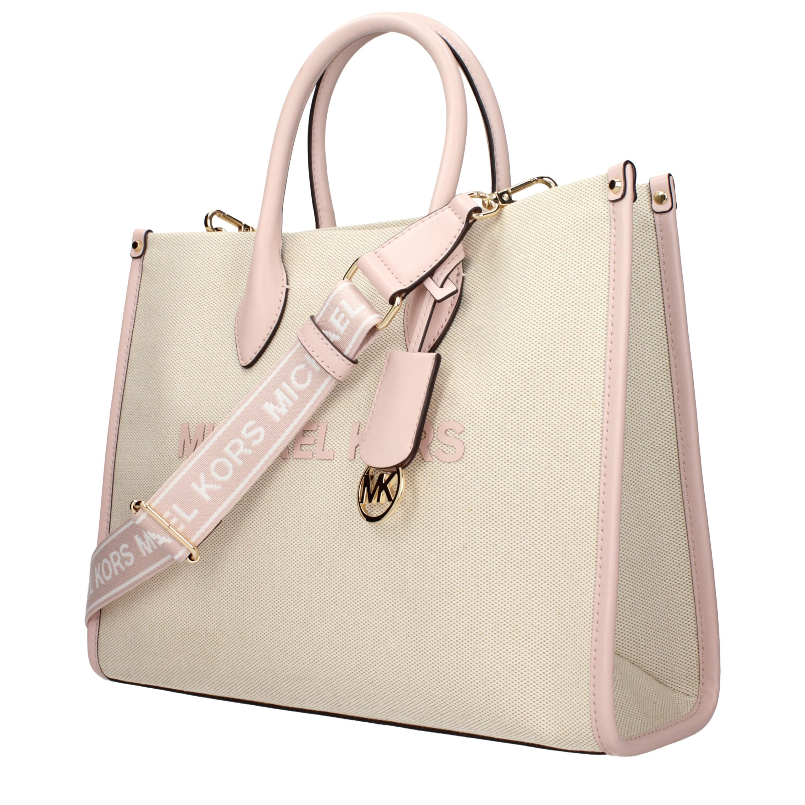 Beige Fabric HandbagDescription: The product with MPN 35S5G7ZT2CPOWDERBLUSH and code F85060 fabric in beige is a handbags designed by Michael Kors. It has features like front logo, adjustable shoulder, removable shoulder, front detail, removable details.B