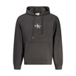 Black Cotton Men Sweater HoodieInfuse your wardrobe with the bold, contemporary edge of Calvin Klein. This sleek black hoodie features meticulous embroidery and a standout print to broadcast your fashion-forward taste. Designed for both comfort and style,