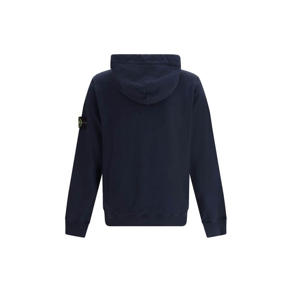 HoodieThe Stone Island Hoodie is an iconic garment with a casual, contemporary style. Featuring a ribbed hem and cuffs, it ensures comfort and a perfect fit. The distinctive detail is the brand’s logo patch applied on the right sleeve, a symbol of authent