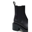Black Leather Ankle BootsBottega Veneta Black Leather Lug Ankle Boots. Maxi black lug sole with heel, round toe, brushed leather, elastic side bands, and a pull-tab at the back for easy on and off. Composition: Leather Internal SKU: 25OTT03 Brand SKU: 667