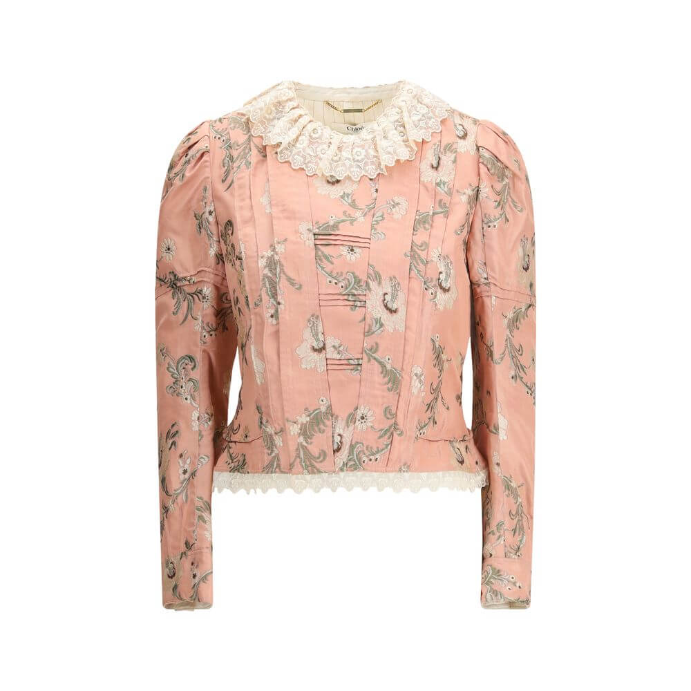 Fitted Jacket in jacquard taffeta and laceThe fitted jacket in jacquard taffeta and lace by Chloé captures a baroque spirit through exquisite craftsmanship. Made from a silk-blend floral jacquard, it is adorned with lace detailing and puffed shoulders tha