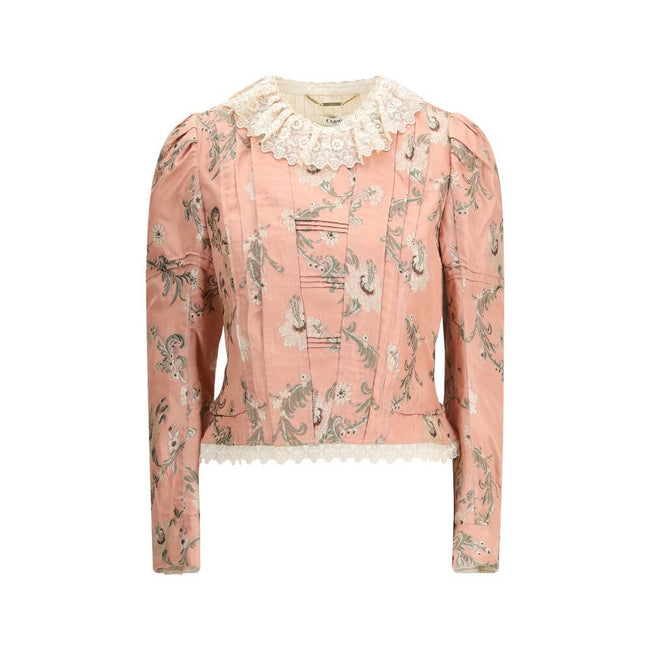 Fitted Jacket in jacquard taffeta and laceThe fitted jacket in jacquard taffeta and lace by Chloé captures a baroque spirit through exquisite craftsmanship. Made from a silk-blend floral jacquard, it is adorned with lace detailing and puffed shoulders tha