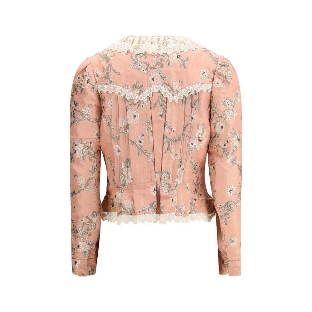 Fitted Jacket in jacquard taffeta and laceThe fitted jacket in jacquard taffeta and lace by Chloé captures a baroque spirit through exquisite craftsmanship. Made from a silk-blend floral jacquard, it is adorned with lace detailing and puffed shoulders tha