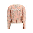 Fitted Jacket in jacquard taffeta and laceThe fitted jacket in jacquard taffeta and lace by Chloé captures a baroque spirit through exquisite craftsmanship. Made from a silk-blend floral jacquard, it is adorned with lace detailing and puffed shoulders tha
