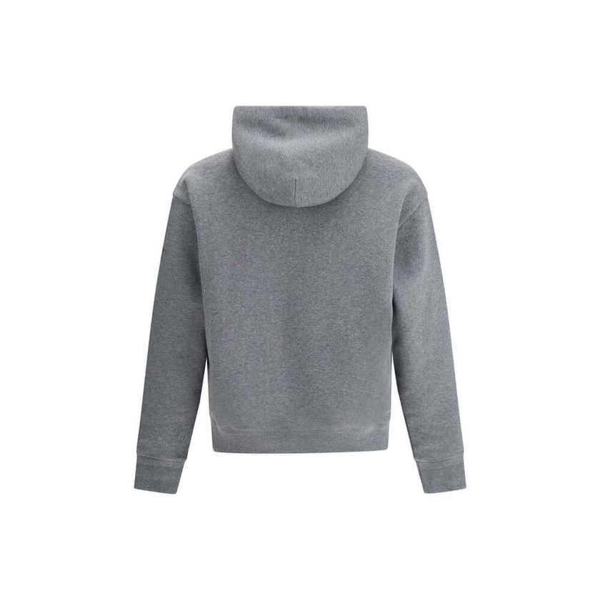 Gray Cotton SweatshirtThe Moncler Grenoble mountain-logo Hoodie blends functionality with sporty elegance. Crafted from soft cotton-blend fleece, it features a relaxed silhouette, an adjustable hood, and an embroidered logo patch on the chest, evoking the