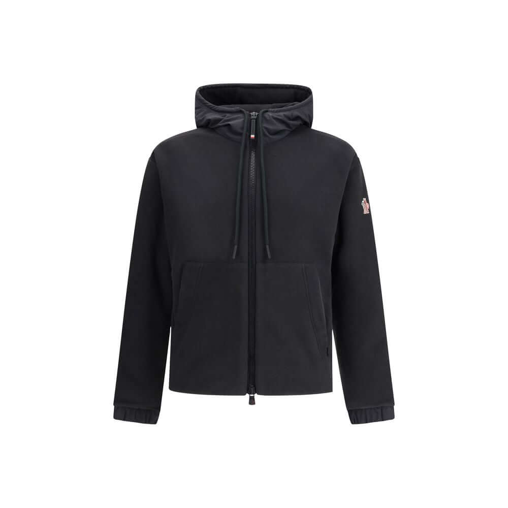 Black Polyester Shell JacketThe Moncler Grenoble zip-up Hoodie in Polartec® is designed for outdoor pursuits, from trekking to hiking, while retaining the Maison’s refined technical edge. Crafted from Polartec® Insulation Double Micro Velour for warmth an