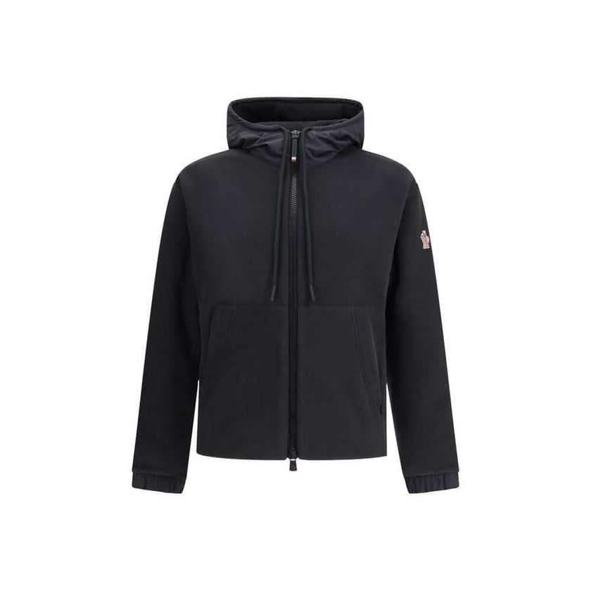 Black Polyester Shell JacketThe Moncler Grenoble zip-up Hoodie in Polartec® is designed for outdoor pursuits, from trekking to hiking, while retaining the Maison’s refined technical edge. Crafted from Polartec® Insulation Double Micro Velour for warmth an