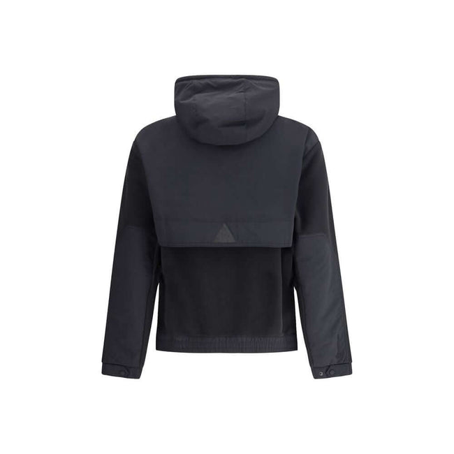 Black Polyester Shell JacketThe Moncler Grenoble zip-up Hoodie in Polartec® is designed for outdoor pursuits, from trekking to hiking, while retaining the Maison’s refined technical edge. Crafted from Polartec® Insulation Double Micro Velour for warmth an