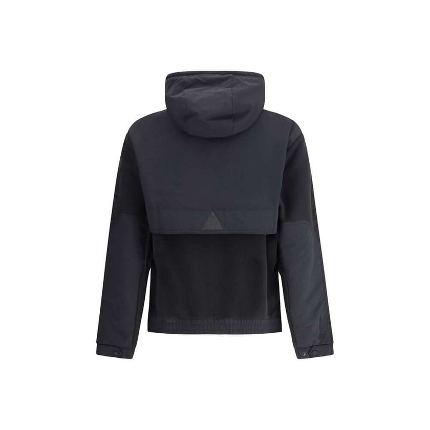 Black Polyester Shell JacketThe Moncler Grenoble zip-up Hoodie in Polartec® is designed for outdoor pursuits, from trekking to hiking, while retaining the Maison’s refined technical edge. Crafted from Polartec® Insulation Double Micro Velour for warmth an