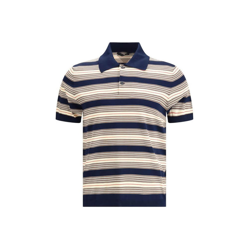 Multicolor Cotton Polo ShirtThe striped cotton Polo by Prada reimagines a menswear classic through the lens of the Maison’s refined aesthetic. Knitted from stretch cotton, it balances comfort and clean lines, enriched with solid-color details that highlig