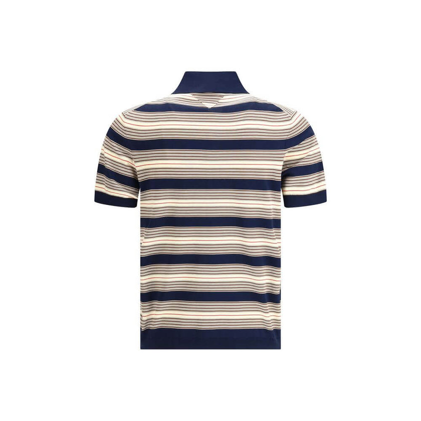 Multicolor Cotton Polo ShirtThe striped cotton Polo by Prada reimagines a menswear classic through the lens of the Maison’s refined aesthetic. Knitted from stretch cotton, it balances comfort and clean lines, enriched with solid-color details that highlig