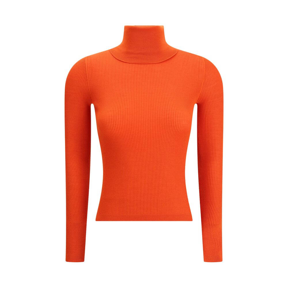 Turtleneck TopThe Yves Saint Laurent Turtleneck Top is an essential piece that enhances the silhouette with its slim fit. Crafted in an all-over ribbed knit, it combines certified cashmere and wool to deliver a soft feel and refined warmth. Ribbed finishe