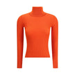 Turtleneck TopThe Yves Saint Laurent Turtleneck Top is an essential piece that enhances the silhouette with its slim fit. Crafted in an all-over ribbed knit, it combines certified cashmere and wool to deliver a soft feel and refined warmth. Ribbed finishe