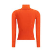 Turtleneck TopThe Yves Saint Laurent Turtleneck Top is an essential piece that enhances the silhouette with its slim fit. Crafted in an all-over ribbed knit, it combines certified cashmere and wool to deliver a soft feel and refined warmth. Ribbed finishe