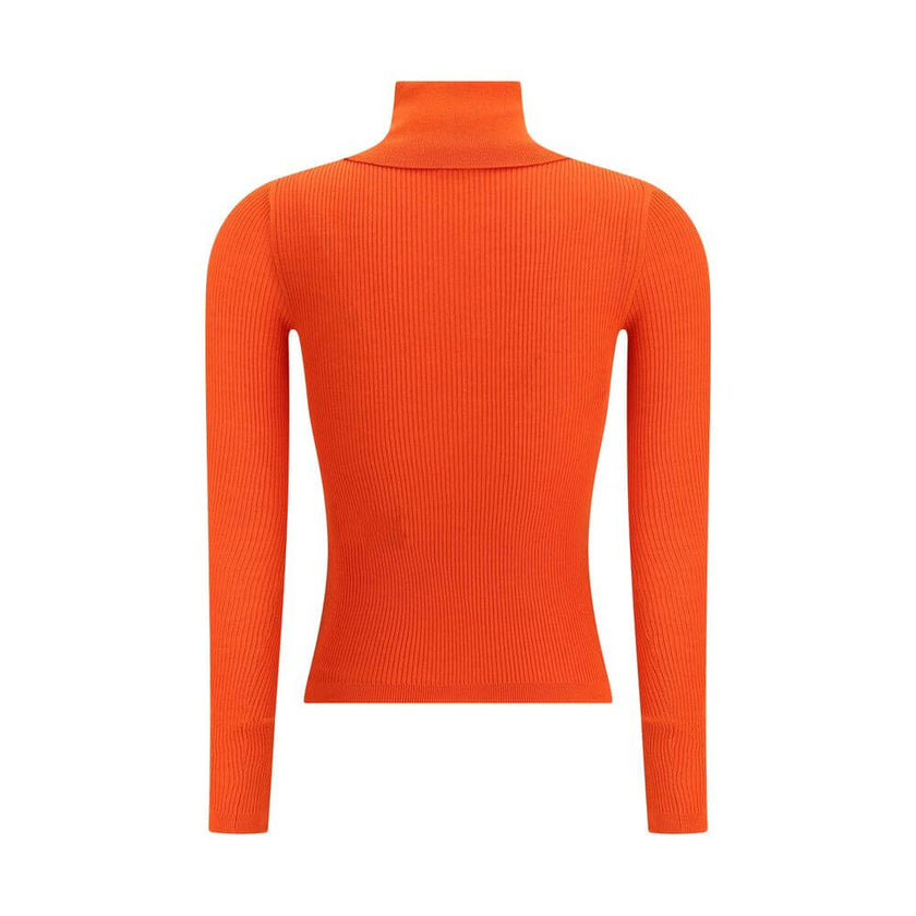 Turtleneck TopThe Yves Saint Laurent Turtleneck Top is an essential piece that enhances the silhouette with its slim fit. Crafted in an all-over ribbed knit, it combines certified cashmere and wool to deliver a soft feel and refined warmth. Ribbed finishe