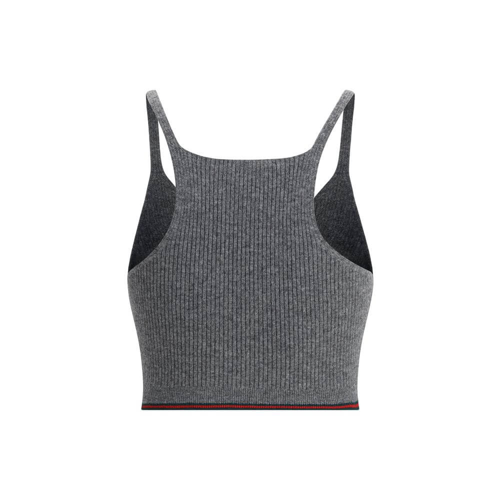 Gray Wool TopThe V-neck ribbed Top by Gucci elevates the simplicity of ribbed knitwear with the narrative power of the maison’s signature green and red Web trim. Essential lines meet iconic detailing, turning a wardrobe staple into an unmistakable style s