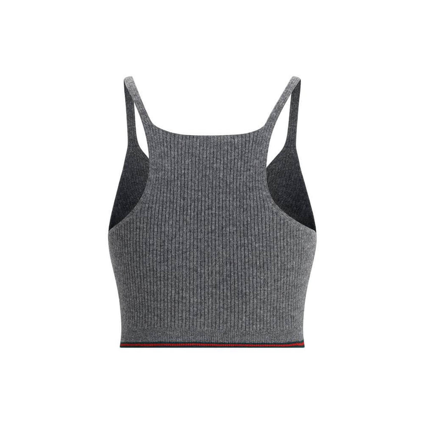 Gray Wool TopThe V-neck ribbed Top by Gucci elevates the simplicity of ribbed knitwear with the narrative power of the maison’s signature green and red Web trim. Essential lines meet iconic detailing, turning a wardrobe staple into an unmistakable style s