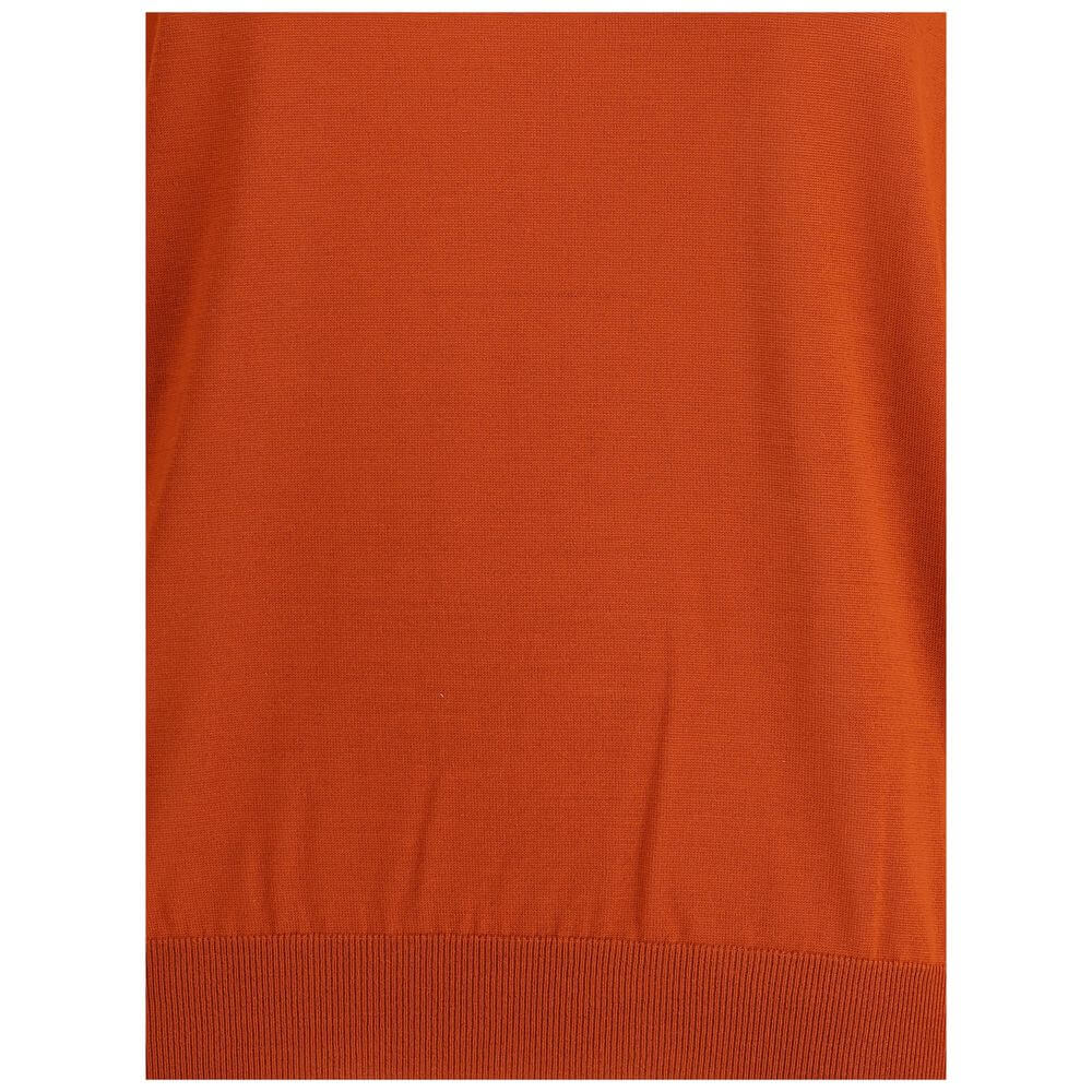 Wool turtleneck SweaterThe Wool turtleneck Sweater by Saint Laurent is a timeless essential that embodies the Maison’s refined elegance. Crafted from soft wool, it features long sleeves and a clean silhouette that enhances the figure with understated soph