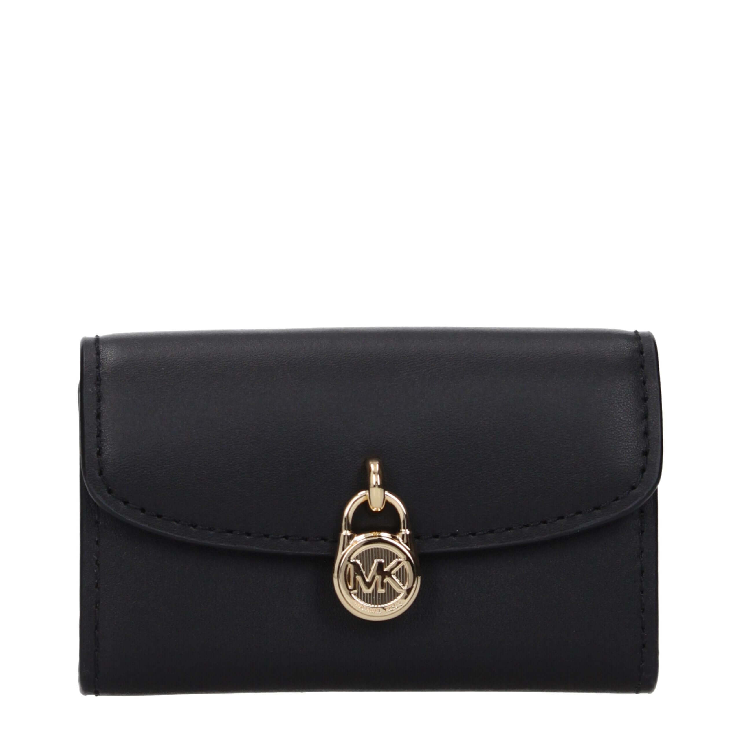 Black Leather WalletDescription: The product with MPN 35S5G1YE0LBLACK and code F85049 leather in black is a coin purses designed by Michael Kors. It has features like front detail, front logo, external pocket.Black Leather Wallet${tagsMichael KorsAulae Bl
