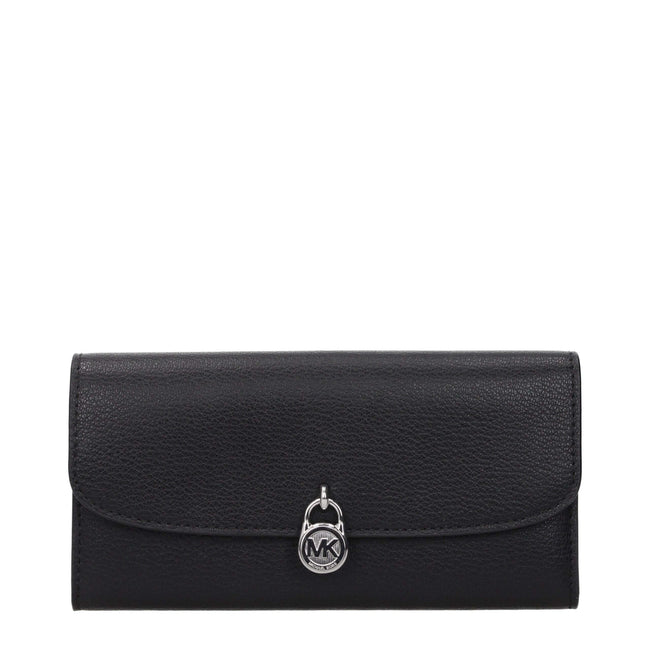 Black Leather WalletDescription: The product with MPN 35S5SHME9LBLACK and code F85082 leather in black is a wallets designed by Michael Kors. It has features like front logo, front detail, external pocket.Black Leather Wallet${tagsMichael KorsAulae Black