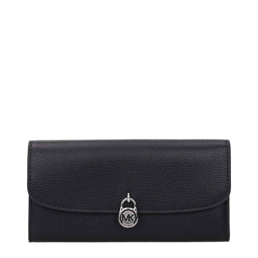 Black Leather WalletDescription: The product with MPN 35S5SHME9LBLACK and code F85082 leather in black is a wallets designed by Michael Kors. It has features like front logo, front detail, external pocket.Black Leather Wallet${tagsMichael KorsAulae Black