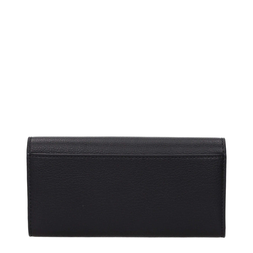 Black Leather WalletDescription: The product with MPN 35S5SHME9LBLACK and code F85082 leather in black is a wallets designed by Michael Kors. It has features like front logo, front detail, external pocket.Black Leather Wallet${tagsMichael KorsAulae Black