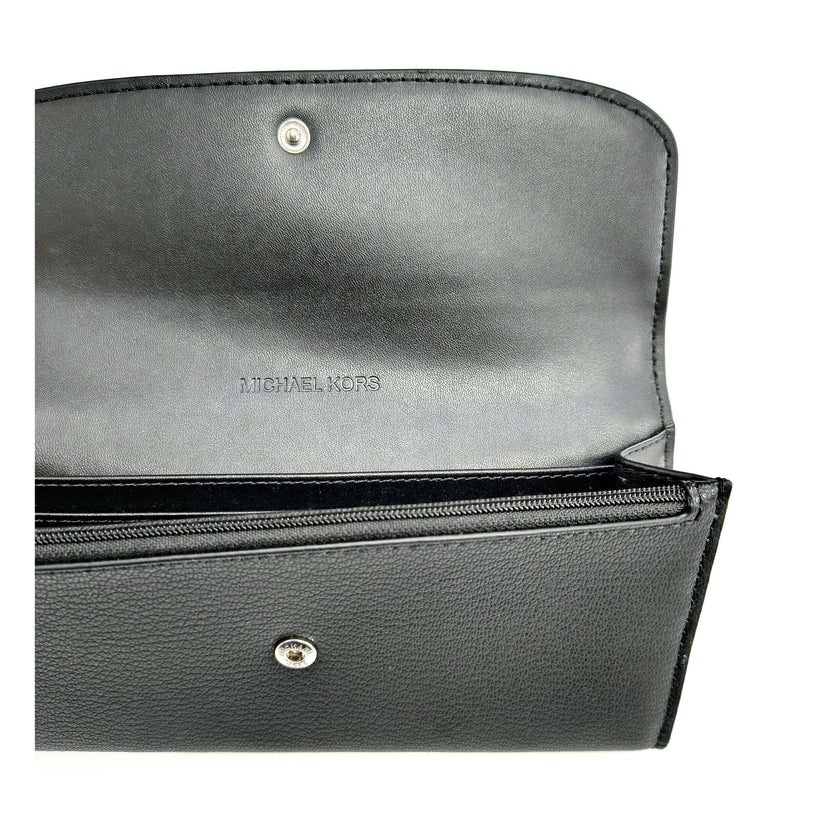 Black Leather WalletDescription: The product with MPN 35S5SHME9LBLACK and code F85082 leather in black is a wallets designed by Michael Kors. It has features like front logo, front detail, external pocket.Black Leather Wallet${tagsMichael KorsAulae Black