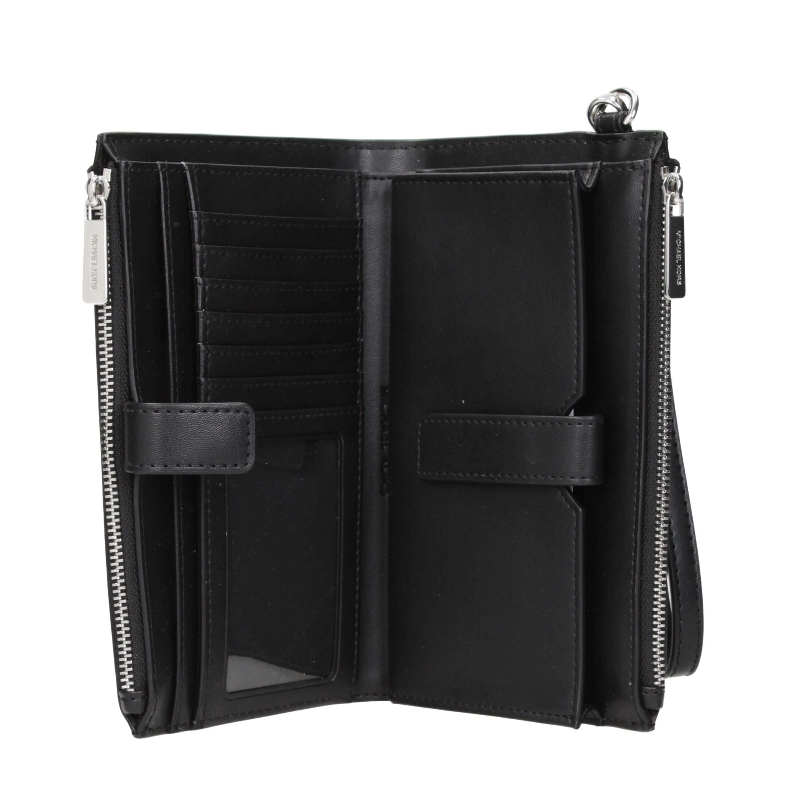 Black Fabric WalletDescription: The product with MPN 35R5STVW3VBLACK and code F85085 fabric in black is a wallets designed by Michael Kors. It has features like logo, removable handle.Black Fabric Wallet${tagsMichael KorsAulae Black Fabric Wallet Michael